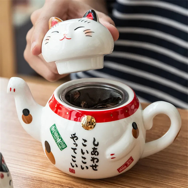 Service à thé japonais porte-bonheur Maneki Neko, tasse et cafetière avec filtre intégré.
