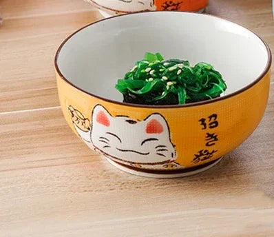 Round ceramic bowl in various sizes, Japanese lucky cat design, ideal for kitchens, restaurants, and homes. Salad bowl, noodle soup bowl, tableware.