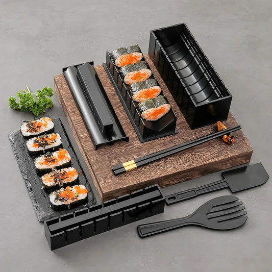 Sushi making kit with various sushi molds, fork, spatula, and utensils for making homemade sushi. Japanese sushi mold.