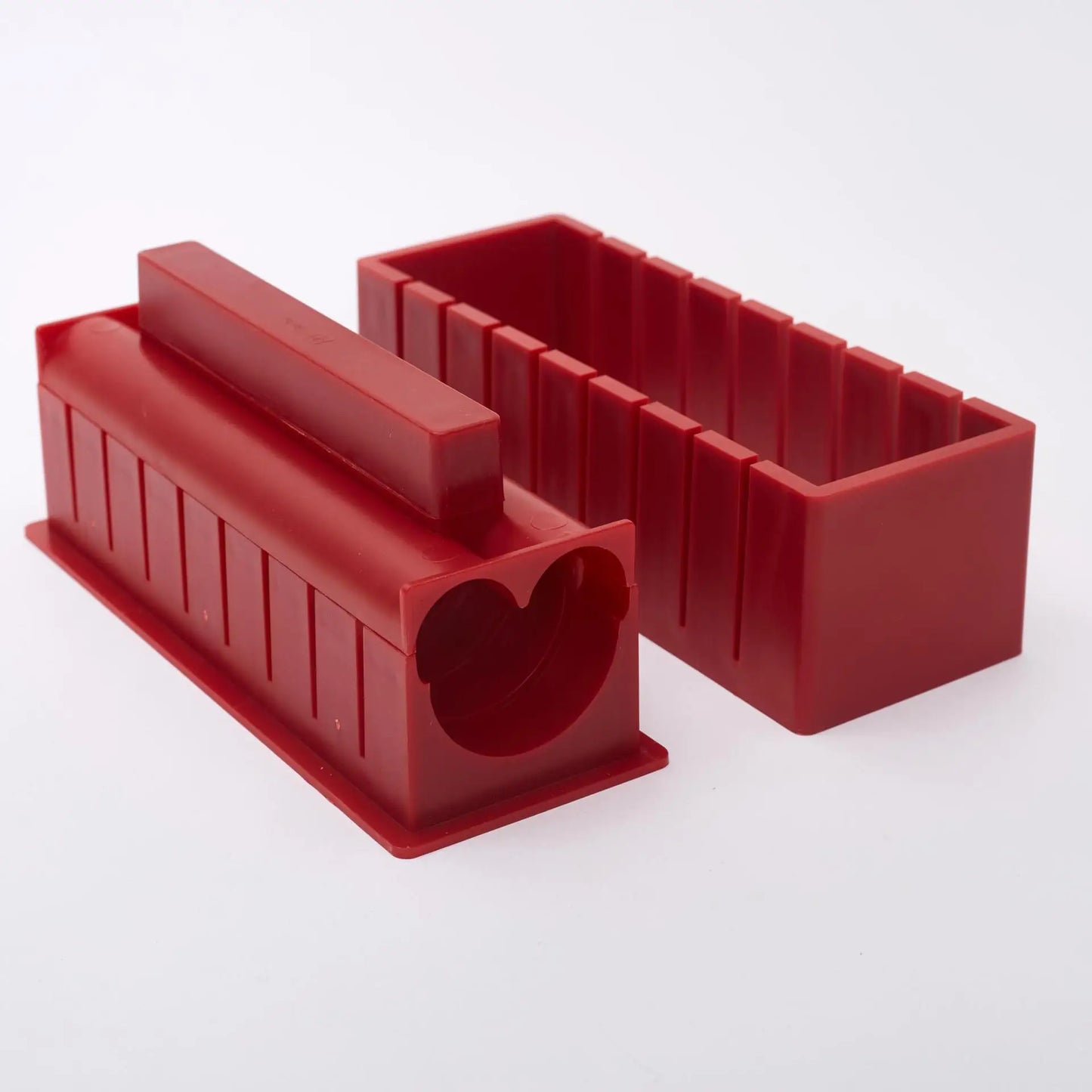 Sushi making kit with various sushi molds, fork, spatula, and utensils for making homemade sushi. Japanese sushi mold.