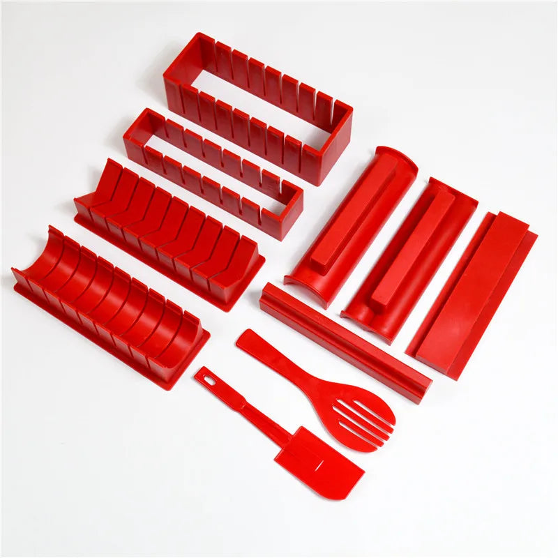 Sushi making kit with various sushi molds, fork, spatula, and utensils for making homemade sushi. Japanese sushi mold.