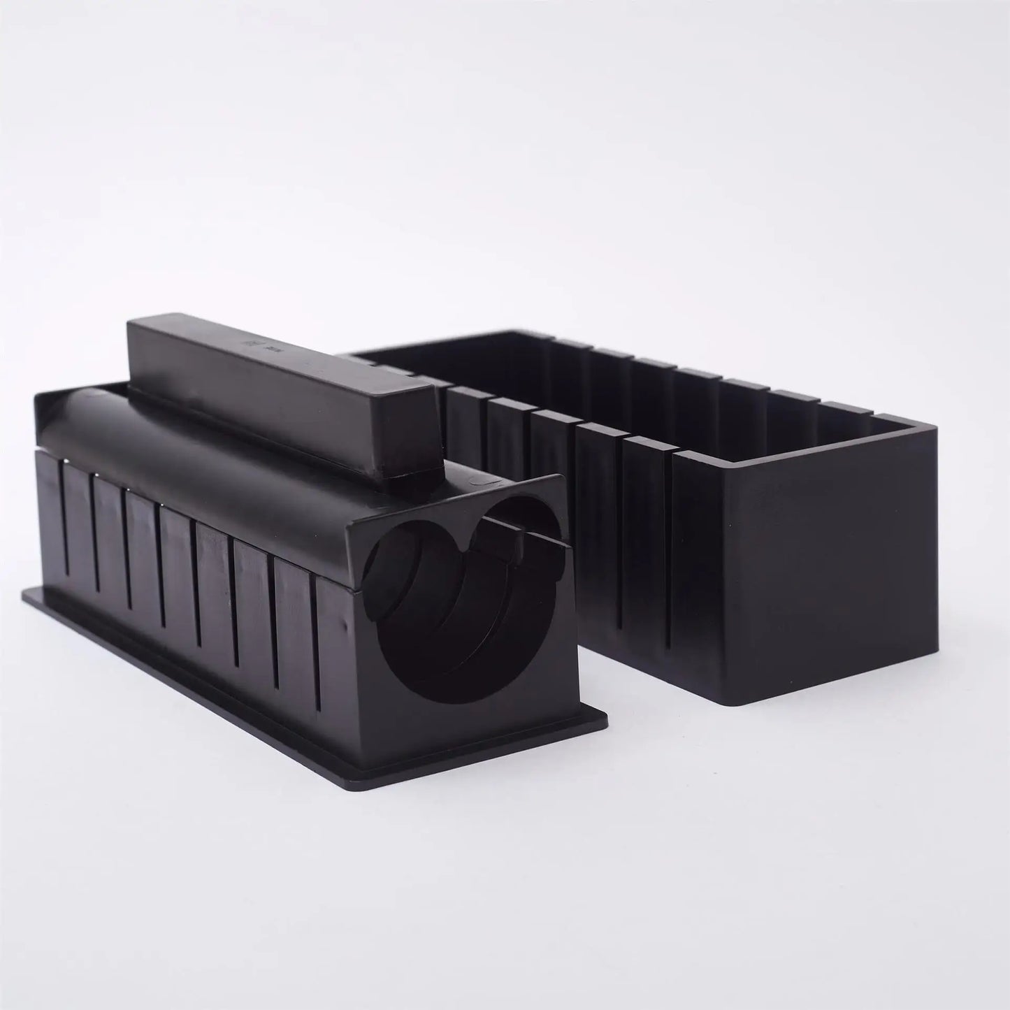 Sushi making kit with various sushi molds, fork, spatula, and utensils for making homemade sushi. Japanese sushi mold.