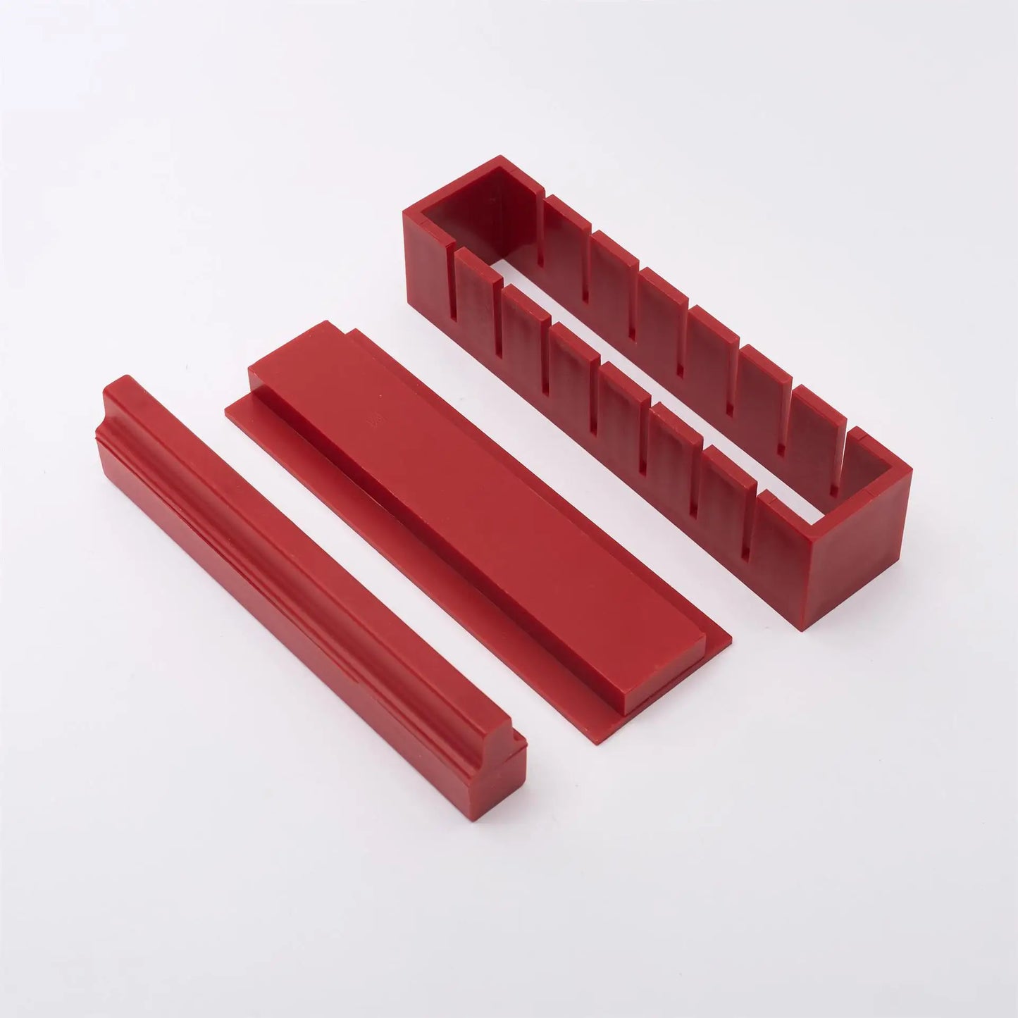 Sushi making kit with various sushi molds, fork, spatula, and utensils for making homemade sushi. Japanese sushi mold.