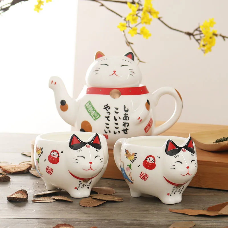 Service à thé japonais porte-bonheur Maneki Neko, tasse et cafetière avec filtre intégré.