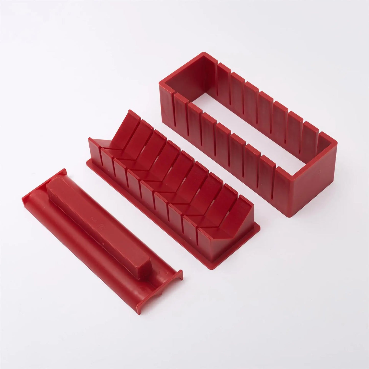 Sushi making kit with various sushi molds, fork, spatula, and utensils for making homemade sushi. Japanese sushi mold.